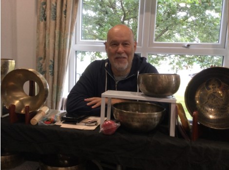 An exhibitor with singing bowls